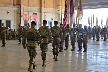 U.S. Army Reserve senior leaders walk to their places in preparation for the passing of the colors during the 377th Theater Sustainment Command change of command ceremony at Naval Air Station Joint Reserve Base New Orleans, Belle Chasse, La. August 3, 2019.