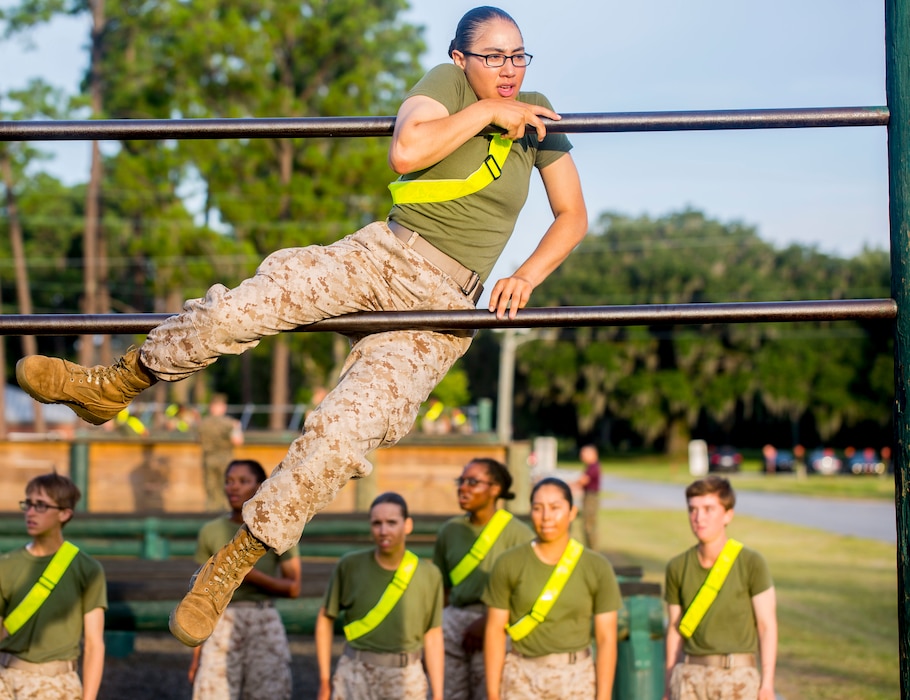A recruit with Oscar Company, 4th Recruit Training Battalion, completes numerous challenges during the Obstacle Course on Marine Corps Recruit Depot Parris Island, S.C., July 26, 2019. This event is comprised of various obstacles and is designed to instill confidence in recruits by overcoming physical challenges. (U.S. Marine Corps photo by Lance Cpl. Dylan Walters)