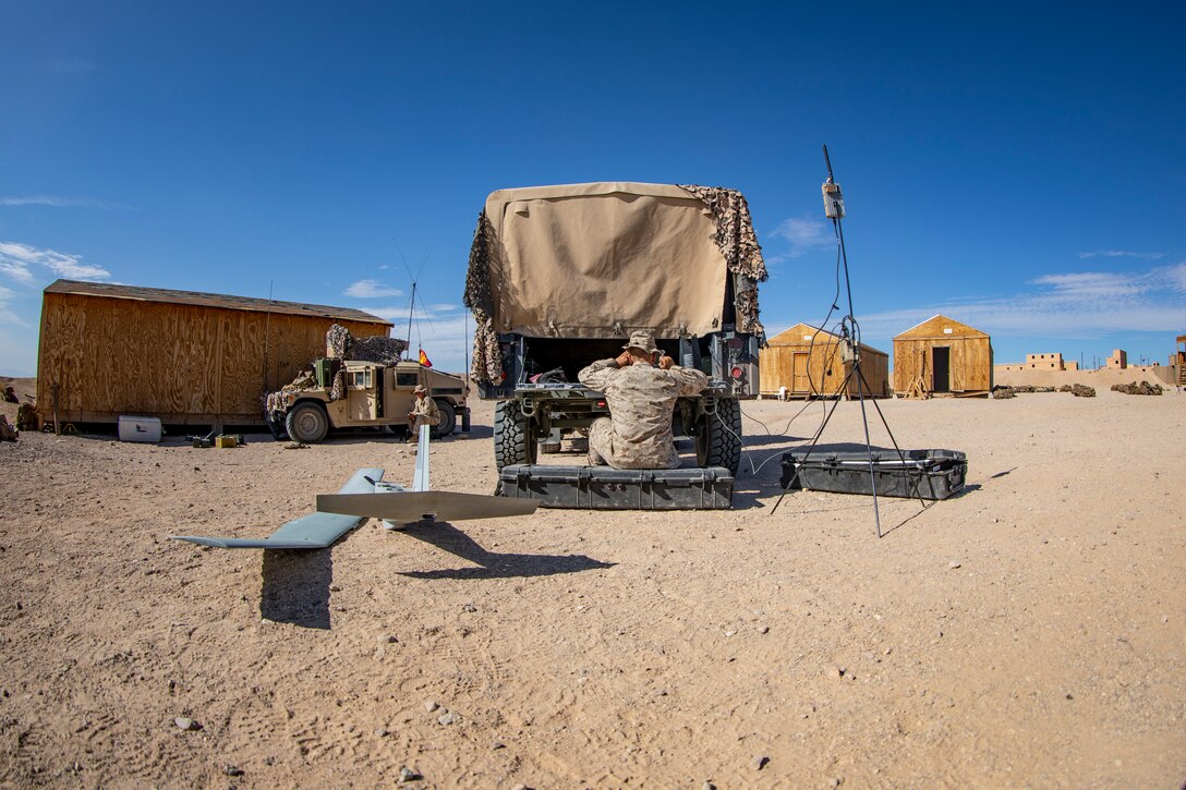 U.S. Marine Corps Lance Cpl. Harrison Dayton, an intelligence specialist with 1st Battalion, 25th Marine Regiment, 4th Marine Division, prepares a RQ-20 Puma Unmanned Aerial System at Marine Corps Air Ground Combat Center Twentynine Palms, Calif., July 31, 2019, during Integrated Training Exercise 5-19. Reserve Marines with 1/25 participate in ITX to prepare for their upcoming deployment to the Pacific Region. (U.S. Marine Corps photo by Sgt. Andy O. Martinez)