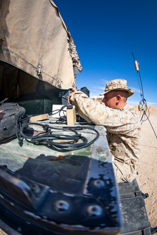U.S. Marine Corps Lance Cpl. Harrison Dayton, an intelligence specialist with 1st Battalion, 25th Marine Regiment, 4th Marine Division, troubleshoots the RQ-20 Puma Unmanned Aerial System on a toughbook laptop at Marine Corps Air Ground Combat Center Twentynine Palms, Calif., July 31, 2019, during Integrated Training Exercise 5-19. Reserve Marines with 1/25 participate in ITX to prepare for their upcoming deployment to the Pacific Region. (U.S. Marine Corps photo by Sgt. Andy O. Martinez)