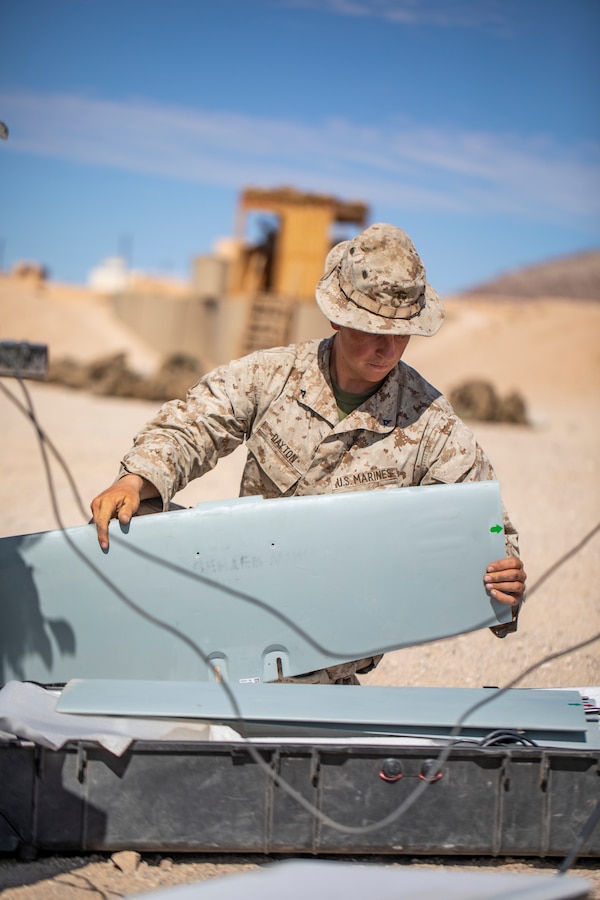 U.S. Marine Corps Lance Cpl. Harrison Dayton, an intelligence specialist with 1st Battalion, 25th Marine Regiment, 4th Marine Division, packs the RQ-20 Puma Unmanned Aerial System away at Marine Corps Air Ground Combat Center Twentynine Palms, Calif., July 31, 2019, during Integrated Training Exercise 5-19. Reserve Marines with 1/25 participate in ITX to prepare for their upcoming deployment to the Pacific Region. (U.S. Marine Corps photo by Sgt. Andy O. Martinez)