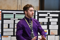 IMAGE: DAHLGREN, Va. (July 25, 2019) — A student briefs attendees on his technical project as his summer internship concluded at the Naval Surface Warfare Center Dahlgren Division. He was among 20 college students who completed their internships via the Naval Research Enterprise Internship Program (NREIP). The program encourages students to pursue science and engineering careers, furthers education via mentoring and their participation in research, and makes them aware of Navy research and technology efforts, which can lead to civilian employment within the Navy.