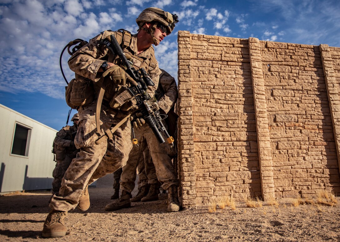 A U.S. Marine with 1st Battalion, 25th Marine Regiment, 4th Marine Division, rushes towards his objective during Integrated Training Exercise 5-19 at Marine Corps Air Ground Combat Center Twentynine Palms, Calif., July 31, 2019. Reserve Marines with 1/25 participate in ITX to prepare for their upcoming deployment to the Pacific Region. (U.S. Marine Corps photo by Lance Cpl. Jose Gonzalez)