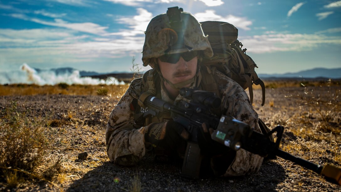 A U.S. Marine with 1st Battalion, 25th Marine Regiment, 4th Marine Division, posts security during Integrated Training Exercise 5-19 at Marine Corps Air Ground Combat Center Twentynine Palms, Calif., July 31, 2019. Reserve Marines with 1/25 participate in ITX to prepare for their upcoming deployment to the Pacific Region. (U.S. Marine Corps photo by Lance Cpl. Jose Gonzalez)
