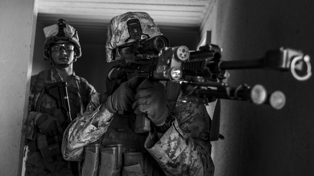 U.S. Marine Corps Lance Cpl. David Cataldo, right, an infantry rifleman with 1st Battalion, 25th Marine Regiment, 4th Marine Division, posts security during Integrated Training Exercise 5-19 at Marine Corps Air Ground Combat Center Twentynine Palms, Calif., July 31, 2019. Reserve Marines with 1/25 participate in ITX to prepare for their upcoming deployment to the Pacific Region. (U.S. Marine Corps photo by Lance Cpl. Jose Gonzalez)