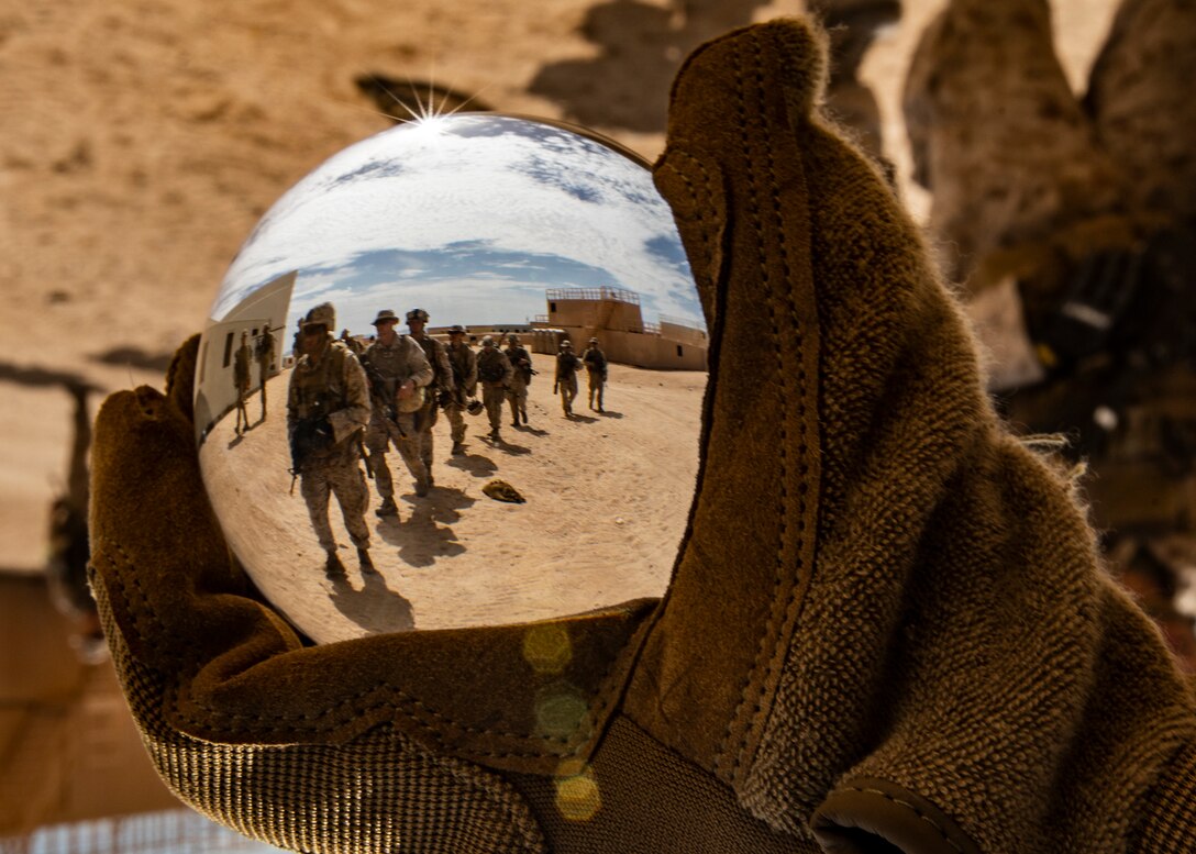 U.S. Marines with 1st Battalion, 25th Marine Regiment, 4th Marine Division, hike towards their next objective during Integrated Training Exercise 5-19 at Marine Corps Air Ground Combat Center Twentynine Palms, Calif., July 31, 2019. Reserve Marines with 1/25 participate in ITX to prepare for their upcoming deployment to the Pacific Region. (U.S. Marine Corps photo by Lance Cpl. Jose Gonzalez)