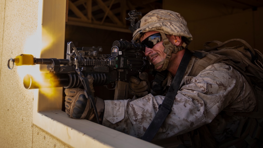 A U.S. Marine infantry rifleman with 1st Battalion, 25th Marine Regiment, 4th Marine Division, engages with simulated hostiles during Integrated Training Exercise 5-19 at Marine Corps Air Ground Combat Center Twentynine Palms, Calif., July 31, 2019. Reserve Marines with 1/25 participate in ITX to prepare for their upcoming deployment to the Pacific Region. (U.S. Marine Corps photo by Lance Cpl. Jose Gonzalez)