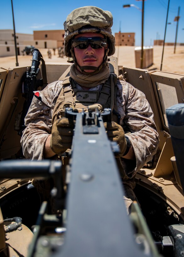 U.S. Marine Corps Pfc. Nick Andrade, a machinegunner with 1st Battalion, 25th Marine Regiment, 4th Marine Division, poses for a photo during Integrated Training Exercise 5-19 at Marine Corps Air Ground Combat Center Twentynine Palms, Calif., July 31, 2019. Reserve Marines with 1/25 participate in ITX to prepare for their upcoming deployment to the Pacific Region. (U.S. Marine Corps photo by Lance Cpl. Jose Gonzalez)