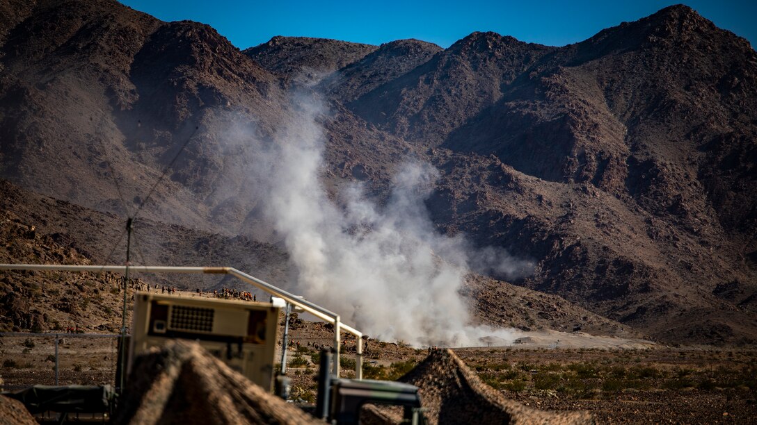 U.S. Marines with 1st Battalion, 25th Marine Regiment, 4th Marine Division, prepare to rush to an objective at Range 400 during Integrated Training Exercise 5-19 at Marine Corps Air Ground Combat Center Twentynine Palms, Calif., Aug. 4, 2019. After ITX 5-19, 1st Battalion, 25th Marine Regiment will be activated and deploy to Indo-Pacific Command to conduct multiple exercises across the region. (U.S. Marine Corps photo by Lance Cpl. Jose Gonzalez)