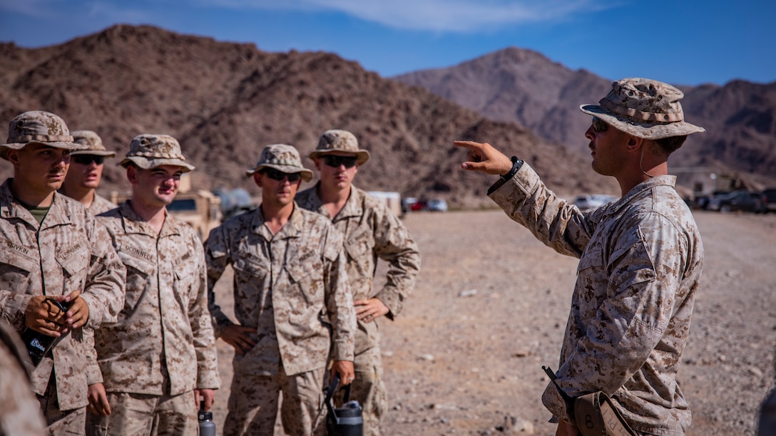 U.S. Marines with 1st Battalion, 25th Marine Regiment, 4th Marine Division, receive a brief during Integrated Training Exercise 5-19 at Marine Corps Air Ground Combat Center Twentynine Palms, Calif., Aug. 4, 2019. After ITX 5-19, 1st Battalion, 25th Marine Regiment will be activated and deploy to Indo-Pacific Command to conduct multiple exercises across the region. (U.S. Marine Corps photo by Lance Cpl. Jose Gonzalez)