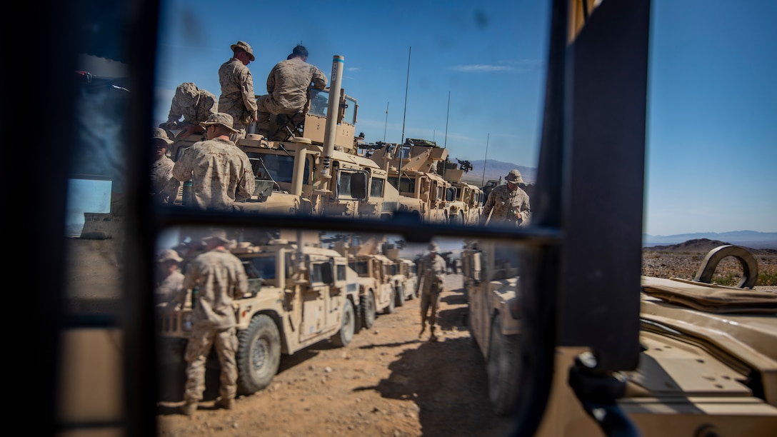 U.S. Marines with 1st Battalion, 25th Marine Regiment, 4th Marine Division, prepare their vehicles on Range 400 during Integrated Training Exercise 5-19 at Marine Corps Air Ground Combat Center Twentynine Palms, Calif., Aug. 4, 2019. After ITX 5-19, 1st Battalion, 25th Marine Regiment will be activated and deploy to Indo-Pacific Command to conduct multiple exercises across the region. (U.S. Marine Corps photo by Lance Cpl. Jose Gonzalez)