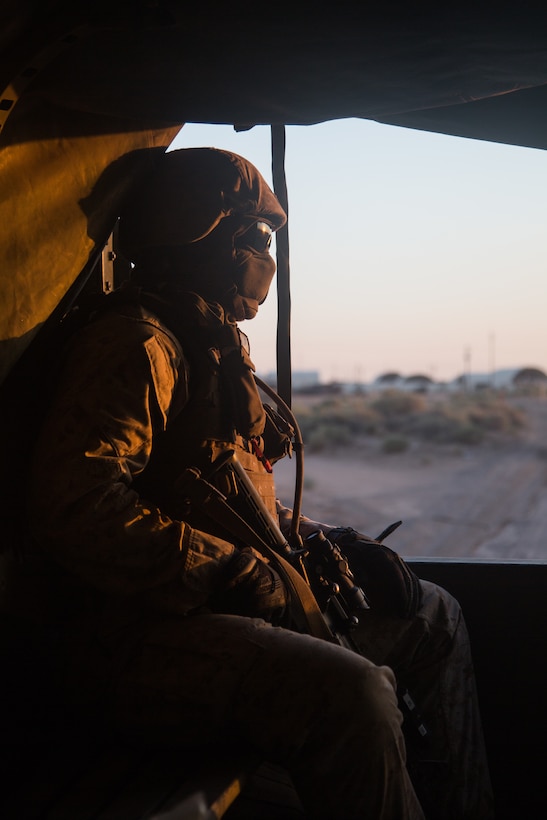U.S. Marine Cpl. Tavanlee Parkin, a combat engineer assigned to Marine Wing Support Squadron 272, rides inside a Medium Tactical Vehicle Replacement during Integrated Training Exercise 5-19 at Marine Corps Air Ground Combat Center, Twenty-nine Palms, California, July 26, 2019. ITX 5-19 is a large-scale, combined-arms training exercise that produces combat-ready forces capable of operating as an integrated Marine Air-Ground Task Force.