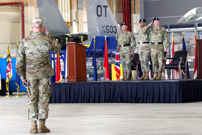 377th Theater Sustainment Command Commanding General, Maj. Gen. Greg Mosser, exchanges salutes with the commander of troops and 377th TSC Deputy Commanding General, Brig. Gen. Vincent Barker, at the conclusion of a change of command ceremony at Naval Air Station Joint Reserve Base New Orleans, Belle Chasse, La., August 3, 2019.