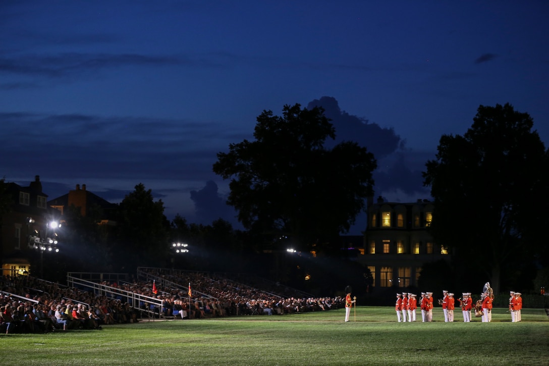 Marines with “The President’s Own” U.S. Marine Band conduct a musical ballad during a Friday Evening Parade at Marine Barracks Washington, D.C., August 2, 2019. The Commandant of the Marine Corps Gen. David H. Berger was the hosting official and the Secretary of the Navy, the Honorable Richard V. Spencer, was the guest of honor for the evening. (U.S. Marine Corps photo by Sgt. Robert Knapp/Released)