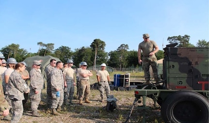 Members of the 235th and 260th Air Traffic Controller Squadrons (ATCS) receive generator training from U.S. Air Force Master Sgt. Jeffrey Van Joolen, in Ramstein, Germany, June. 3rd, 2019. The North Carolina Air National Guard, along with New Hampshire and Maine Air National Guard, flew to Ramstein Air Base, Germany, to work with active duty 1st Combat Communications Squadron. The Air National Guard units assisted in training the active duty unit with set-up, use, and tear-down of a mobile tower and deployable tactical air navigation system.