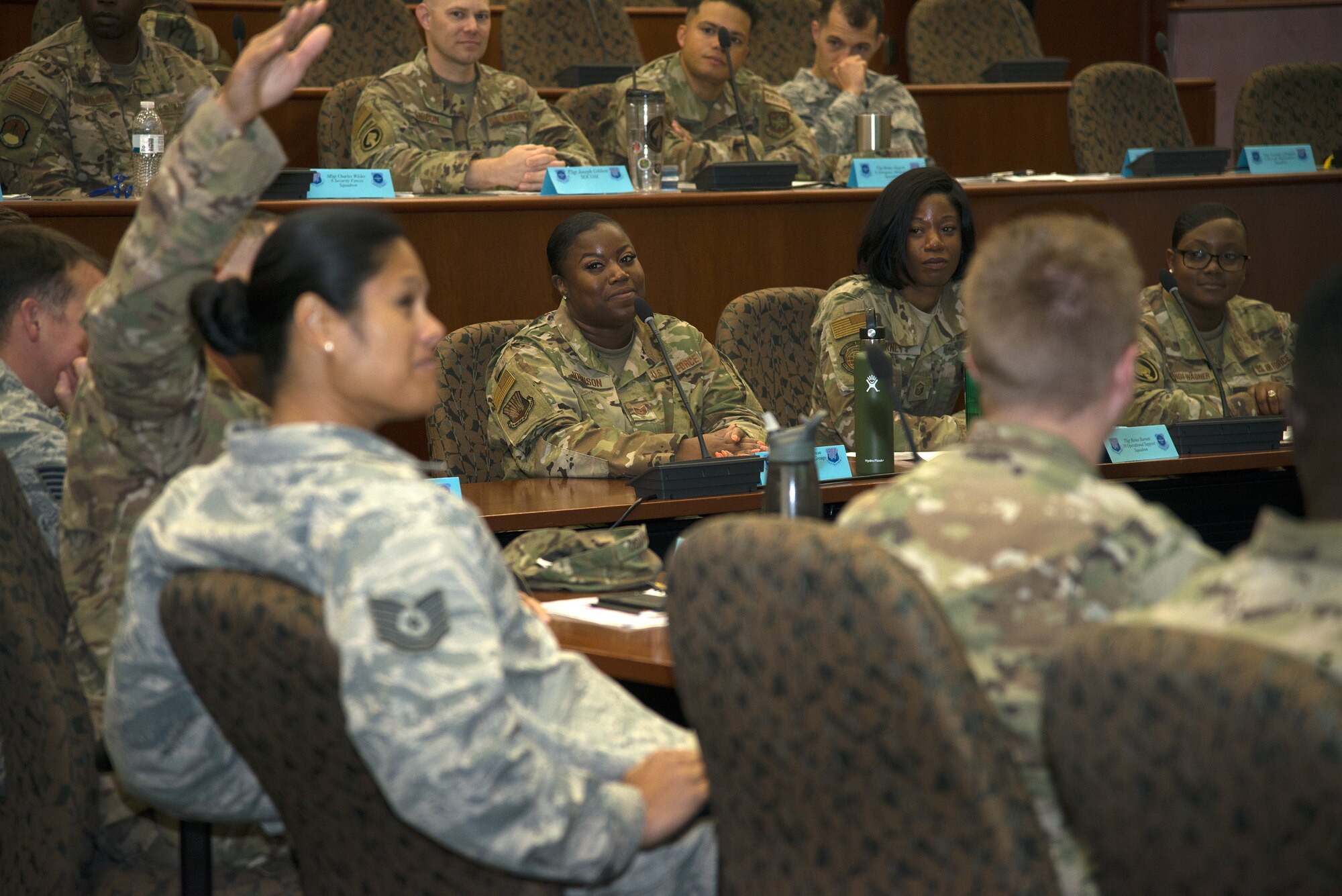 U.S. Air Force Tech. Sgt. Katrina Johnson, 6th Mission Support Group resource advisor, and surrounding students listen to a fellow Master Sgt. select during the SNCO Professional Enhancement Seminar at MacDill Air Force Base, Fla., Aug. 2, 2019.  This professional enhancement seminar is a week-long, discussion-led training course that prepares Airmen for their new SNCO responsibilities.
