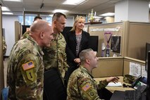 Gen. Paul Funk II, commanding general of U.S. Army Training and Doctrine Command, receives a tour of the U.S. Army Recruiting Command's Recruiting Operations Center. This was Funk's first visit to USAREC since taking command of TRADOC and his first in-depth look at recruiting operations. (U.S. Army photo by Lara Poirrier)