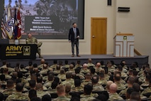 Medal of Honor Recipient Staff Sgt. David Bellavia shares with students of the U.S. Army Recruiting and Retention College the value of what they do for the Army during a presentation at Hazard Auditorium on Fort knox, Kentucky, July 31. He emphasized how important recruiting is in making the Army the best it's ever been with the next generation of Soldiers and leaders. Bellavia was accompanied by Gen. Paul Funk II, commanding general of U.S. Army Training and Doctrine Command. (U.S. Army photo by Lara Poirrier)