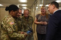 Medal of Honor Recipient Staff Sgt. David Bellavia shares his Medal of Honor with the Soldiers and staff of the U.S. Army Recruiting Command Recruiting Operations Center during a visit to USAREC headquarters at Fort Knox, Kentucky, July 31. Bellavia came to Fort Knox to learn about and show his support for the Army accessions mission and this was his first visit to the command. (U.S. Army Photo by Lara Poirrier)