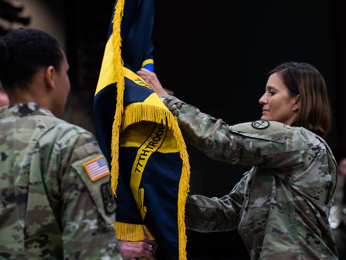 Col. Michaelle Munger relinquishes command to Lt. Col. Tanya McGonegal Aug. 3, 2019, during a formal change of command ceremony for the 77th Brigade. McGonegal is the first female African American brigade commander and Munger was the first female brigade commander in the WVARNG’s history. (U.S. Army National Guard photo by Sgt. Davis Rohrer)