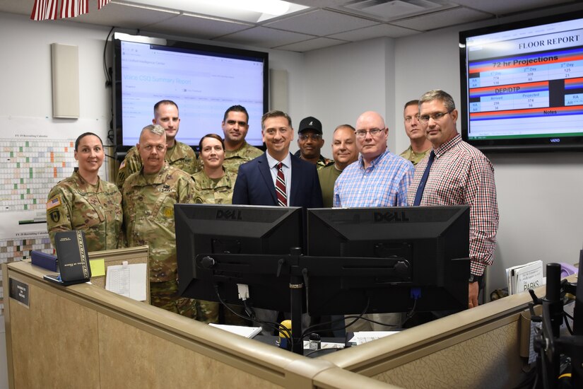 Medal of Honor Recipient Staff Sgt. David Bellavia stops for a photo with the Soldiers and staff of the U.S. Army Recruiting Command Recruiting Operations Center during a visit to USAREC headquarters at Fort Knox, Kentucky, July 31. Bellavia came to Fort Knox to learn about and show his support for the Army accessions mission and this was his first visit to the command. (U.S. Army Photo by Laura Poirrier)