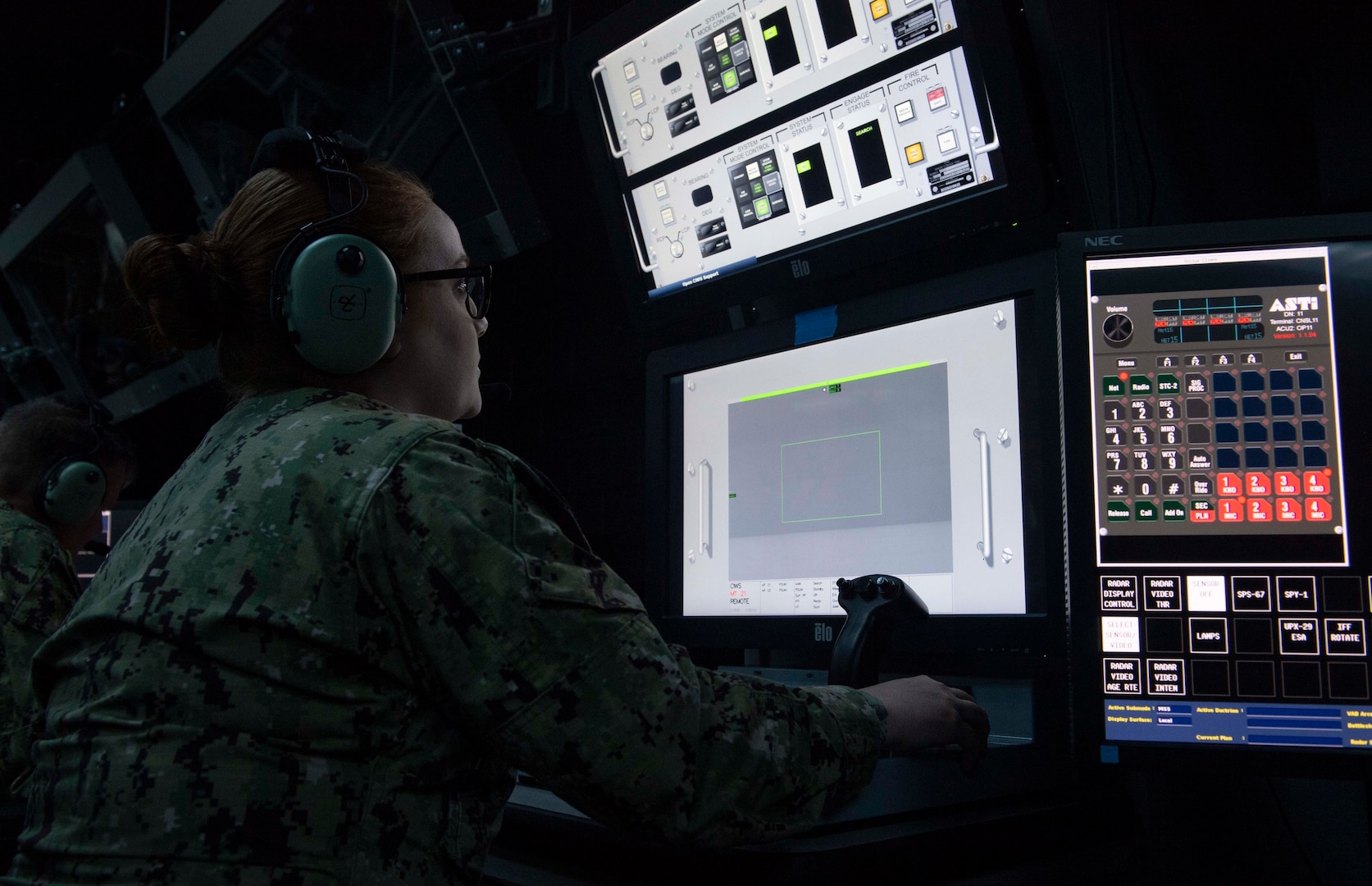 190611-N-HV059-1056 
NORFOLK (June 11, 2019) Fire Controlman 1st Class Jessica Himmelberger mans a simulated close-in weapon’s system (CWIS) station at the Center for Surface Combat Systems (CSCS) Combined Integrated Air and Missile Defense (IAMD) / Anti-Submarine Warfare (ASW) Trainer (CIAT) at Naval Base Norfolk. The CSCS mission is to develop and deliver surface ship combat systems training to the fleet and achieve surface warfare superiority. (U.S. Navy photo by Mass Communication Specialist 2nd Class Sonja Wickard/Released)