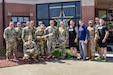 Gen. Paul Funk II, commanding general of U.S. Army Training and Doctrine Command, and Medal of Honor Recipient Staff Sgt. David Bellavia take a photo with Soldiers of the U.S. Army Marketing Engagement Brigade at the end of their visit to the brigade headquarters at Fort Knox, Kentucky, Aug. 1. During their visit, Funk and Bellavia had the opportunity to meet members of the U.S. Army Outreach Company, which owns the Musical Outreach Team, the Army Warrior Fitness Team, and the Army Esports Team. These teams have the task of supporting recruiting operations by generating public interest in the U.S. Army as they engage in activities and travel around the U.S. (U.S. Army photo by Lara Poirrier)