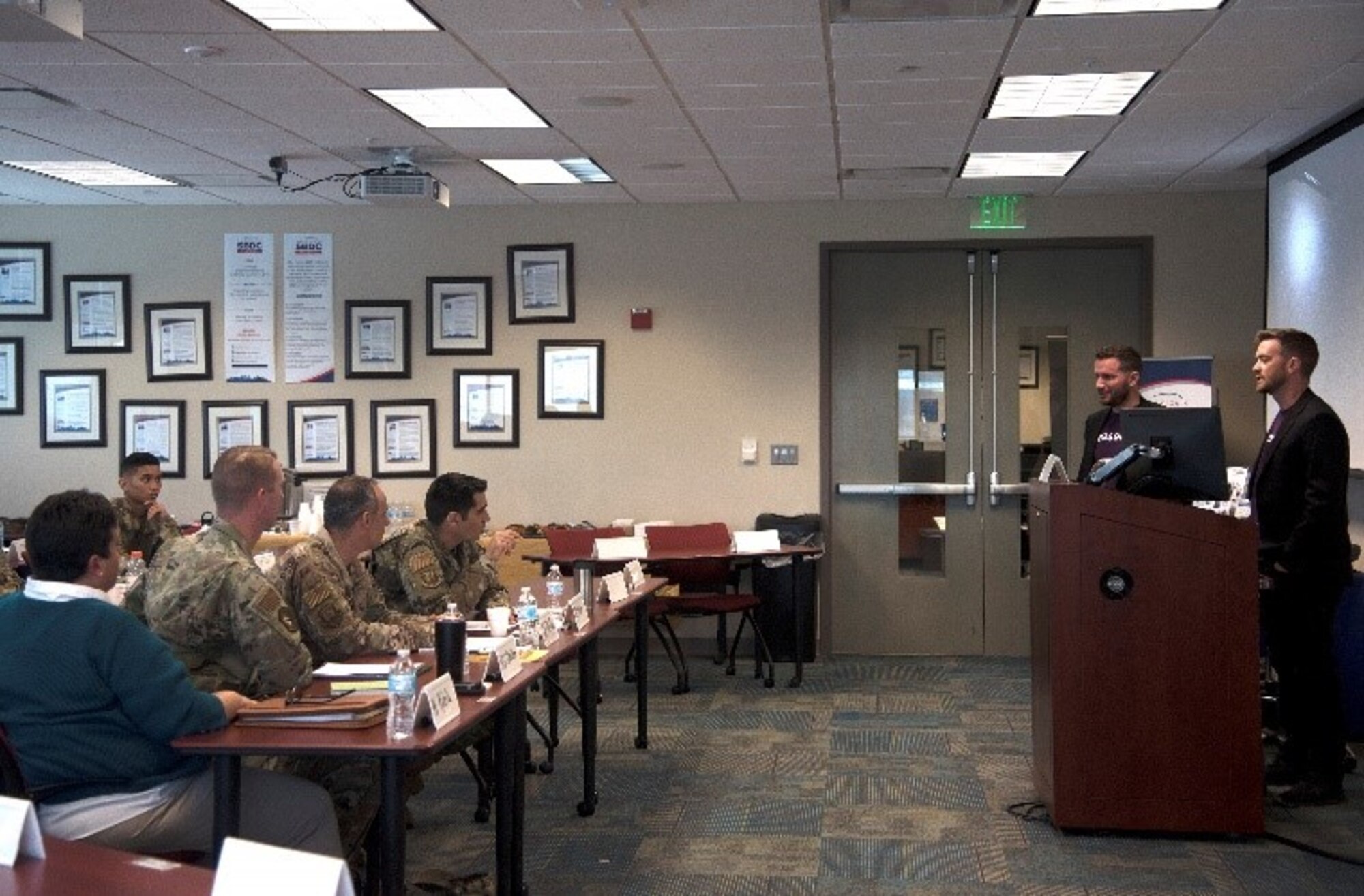 6th Air Mobility Wing leaders award a contract to a local small business at MacDill’s first ever Pitch Day Aug. 1, 2019.