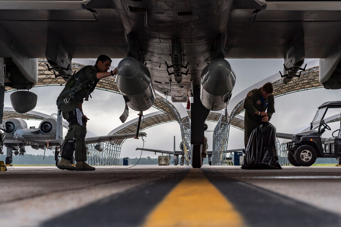 Pilots from the 74th Fighter Squadron (FS) prepare to depart for Jaded Thunder, Aug. 2, 2019, at Moody Air Force Base, Ga. Jaded Thunder is a joint services exercise to complete training requirements and prepare for future deployments. It includes joint forces integration by members of U.S. Air Force, Marine Corps, Navy and Army units, as well as representatives of the U.S. Special Operations Command. (U.S. Air Force photo by Airman 1st Class Hayden Legg)