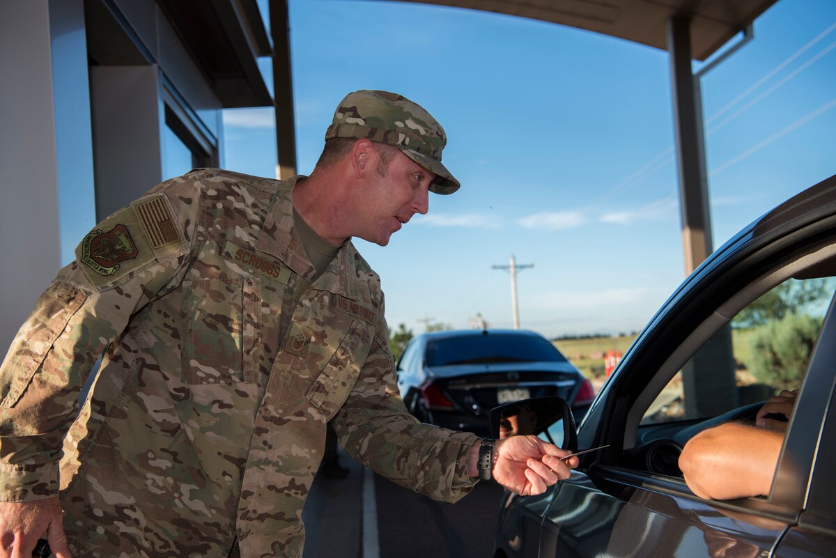 First sergeants check IDs at Schriever AFB gate > Air Force Test Center