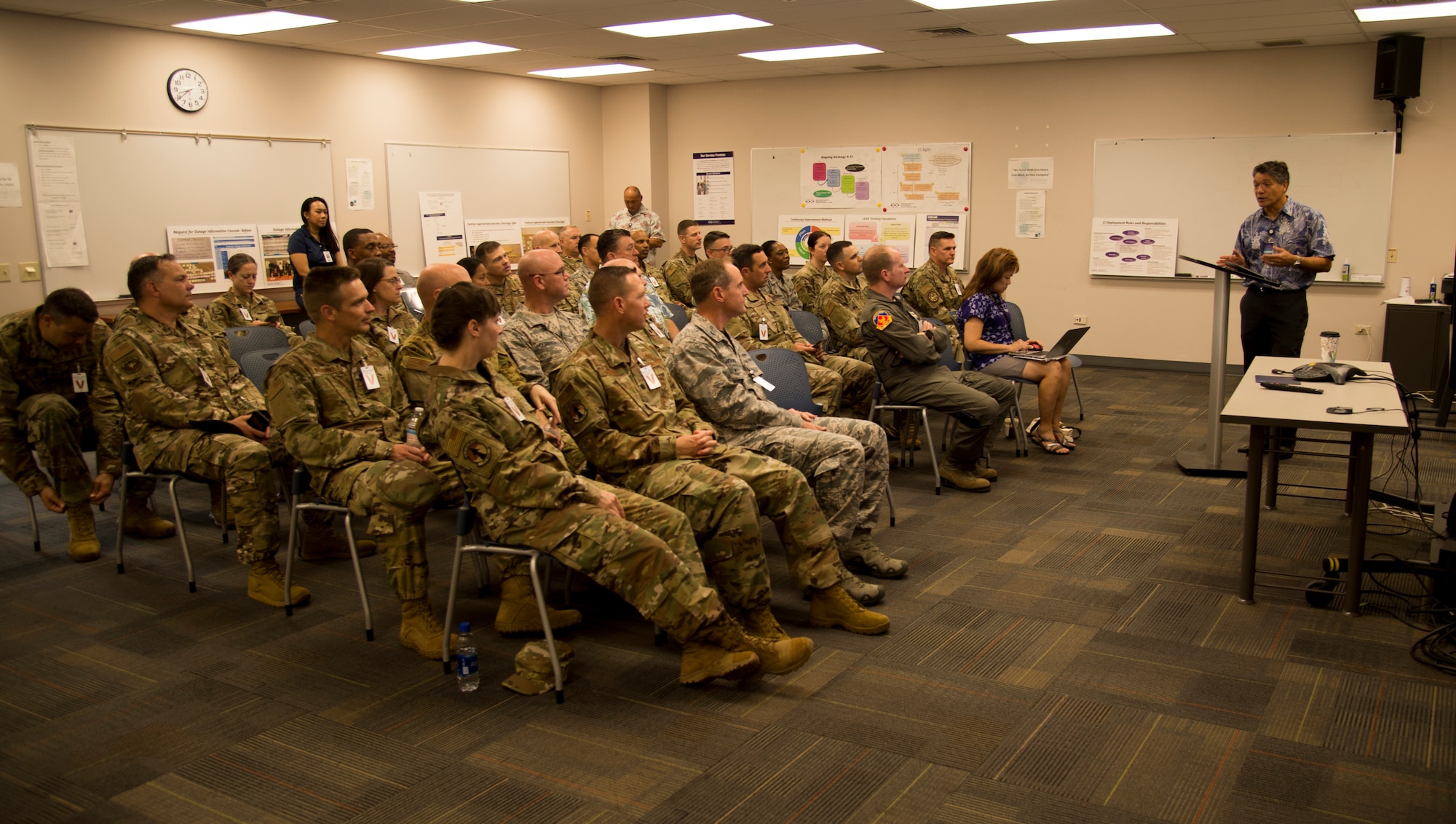 Bob Krekel, Hawaii Electric Company Enterprise Performance Excellence-Execution director, highlights HECO continuous process improvement achievements to U.S. Air Force CPI Senior Leader Course participants at the HECO headquarters Aug. 2, 2019. The course is designed to teach senior leaders how to remove waste from process to better execute the Air Force mission. (U.S. Air Force photo by 2nd Lt. Amber R. Kelly-Herard)