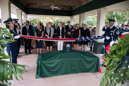 Nancy, surviving wife of Oliver "Ollie�" Crawford, watches U.S. Air Force Honor Guard Airmen fold the American flag during her husband's funeral ceremony Aug. 5, 2019, at Joint Base San Antonio-Fort Sam Houston, Texas.