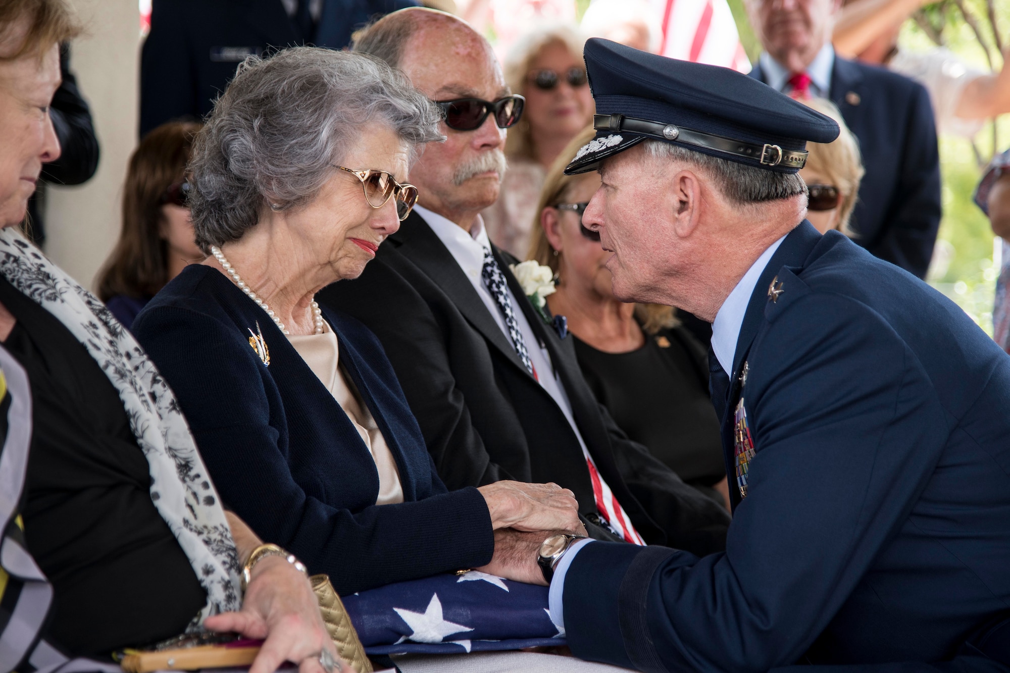 Nancy (left), surviving wife of Oliver "Ollie" Crawford, is presented the American flag by retired Lt. Gen. John Bradley Aug. 5, 2019, at Joint Base San Antonio-Fort Sam Houston, Texas. "Ollie" passed away at the age of 94, on Sunday, July 21, 2019 in San Antonio, Texas.