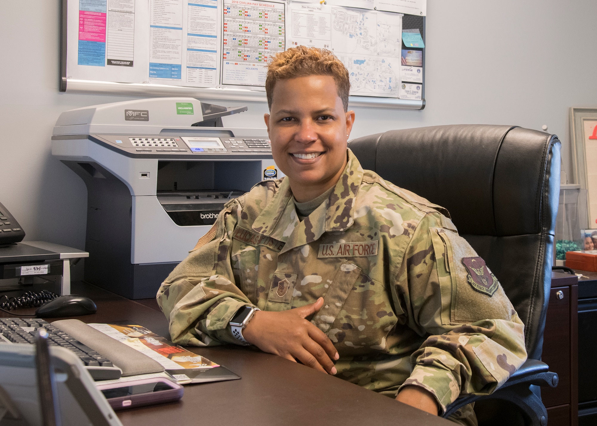 Master Sgt. Heather Lucas-Baptiste, Dover Air Force Base’s Air Force Reserve in-service recruiter, sits in her office at the Visitors Center July 22, 2019, at Dover Air Force Base, Del. Lucas-Baptiste assists Airmen transitioning from active duty to the reserves through the Palace Chase and Palace Front programs. (U.S. Air Force photo by Staff Sgt. Zoe Russell)