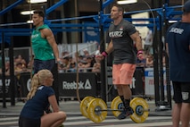 Lt. Col. Anthony Kurz, a member of the U.S. Army Warrior Fitness Team assigned to the Asymmetric Warfare Group in Fort Meade, Md., competes in the Men's Masters (40-44) Division at the 2019 CrossFit Games in Madison, Wis., Aug. 3, 2019. During his second event, Kurz had to complete three rope climbs 15 front squats, and 60 double-unders over five rounds for time. (Photo Credit: Devon L. Suits)