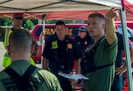 Members of the 61st Civil Support Team, Arkansas National Guard, brief their incident response plan to the West Licking Joint Fire District chief during Vigilant Guard 19-4, Aug. 5, 2019, at the Ohio Fire Academy in Reynoldsburg, Ohio. Vigilant Guard brings together over 3,000 personnel from more than 90 local, state and federal agencies to train and develop disaster response capabilities in the largest exercise of its kind in the state’s history.