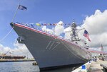 PORT EVERGLADES, Fla. (July 27, 2019) The crew of the Navy's newest Arleigh Burke-class guided-missile destroyer, USS Paul Ignatius (DDG 117), brings the ship to life during its commissioning ceremony. Paul Ignatius is the 67th Arleigh Burke-class destroyer and the first warship named for the former Secretary of the Navy who served under President Lyndon Johnson from 1967 to 1969.