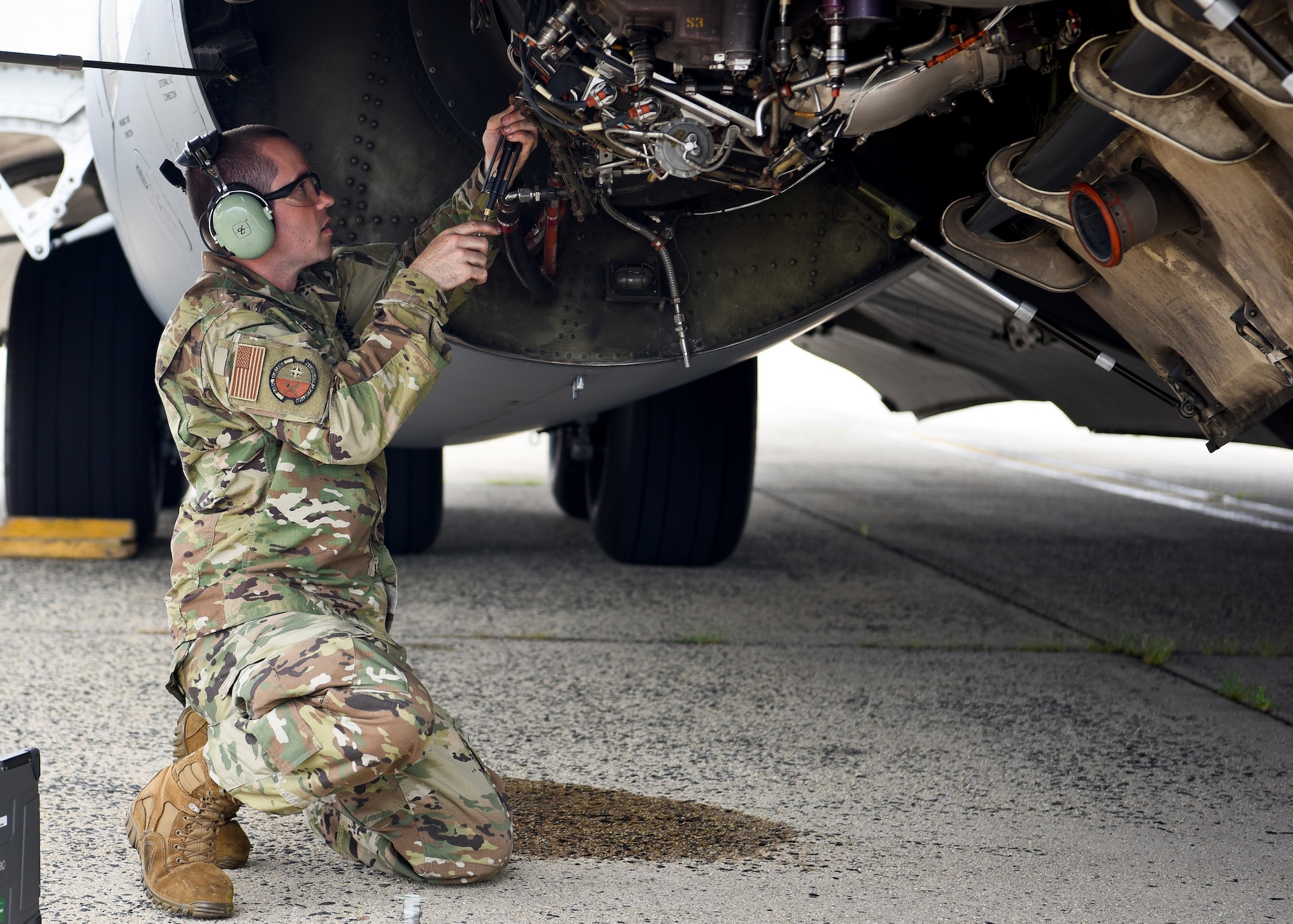 U.S. Air Force Senior Airman Joshua Bridges, 305th Aircraft Maintenance Squadron jet engine mechanic, works on the engine of a C-17 Globemaster August 2, 2019 on Joint Base McGuire-Dix-Lakehurst, New Jersey. Jet engine mechanics are able to diagnose engine problems to include fuel, oil, electrical and engine airflow systems. (U.S. Air Force photo by Airman 1st Class Briana Cespedes)