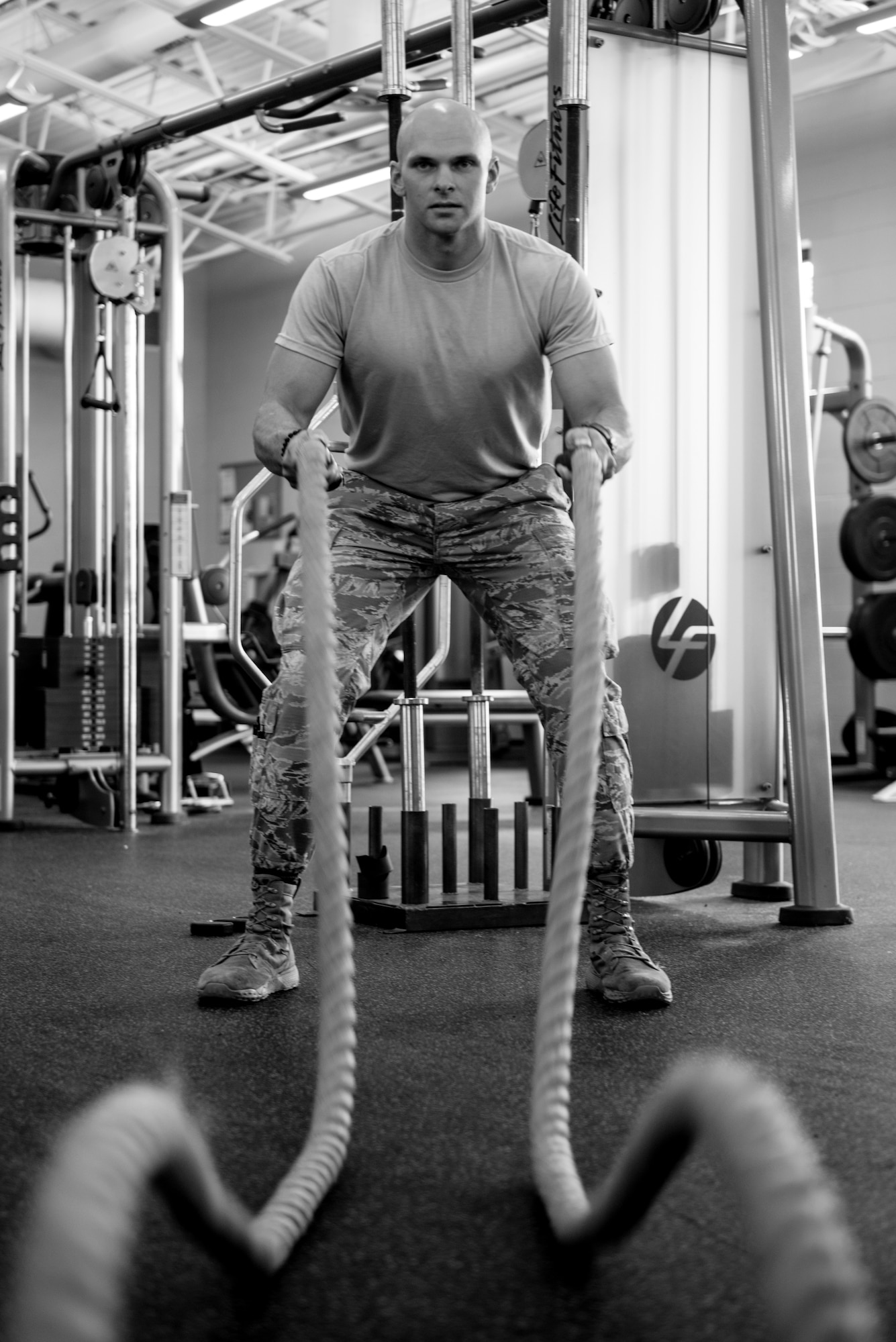 Airman 1st Class Adam Schuck, a services specialist with the 193rd Special Operations Force Support Squadron, Pennsylvania Air National Guard, works out with battle ropes