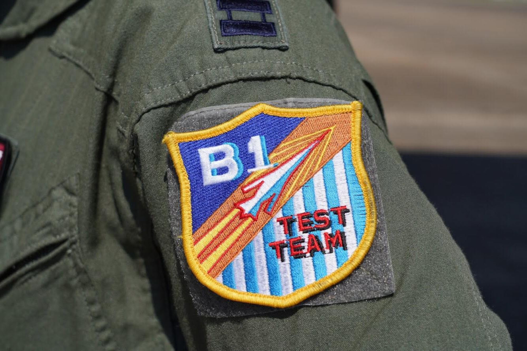 A pilot wears the B-1 “Test Team” patch of the 337th Test and Evaluation Squadron located at Dyess AFB, Texas during a tour on July 30, 2016 at Eglin Air Force Base, Fla. Aircrew brought the 53rd Wing bomber to allow wing personnel an opportunity to see one of their geographically separated aircraft up close. (U.S. Army photo/SGT Sean Hall)