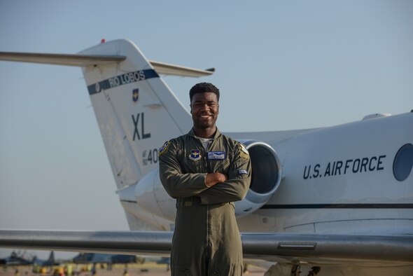 47th Flying Training Wing Class 19-17 graduate and Order of Daedalians AETC Commander’s Trophy recipient, 1st Lt. Tyler Weaver, glances at the T-6 fleet, an aircraft he initially flew during Phase II of pilot training at Laughlin Air Force Base, Texas, July 31, 2019. During each phase of pilot training, students are expected to study, work collaboratively, and seek mentorship from their instructors and senior rated commanders. U.S. Air Force photo by Capt. Mahalia Frost)