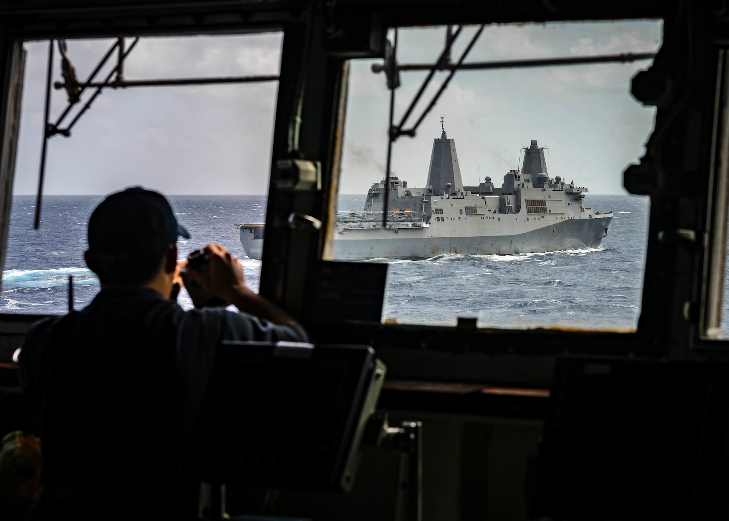 CORAL SEA (August 01, 2019) – The amphibious dock landing ship USS Ashland (LSD 48) sails alongside the amphibious transport dock ship USS Green Bay (LPD 20). Ashland, part of the Wasp Amphibious Ready Group, with embarked 31st Marine Expeditionary Unit, is operating in the Indo-Pacific region to enhance interoperability with partners and serve as a ready-response force for any type of contingency.