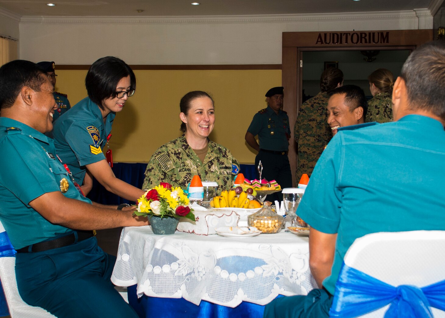 JAVA SEA (August 7, 2019) Capt. Ann McCann, deputy commodore of Commander, Destroyer Squadron 7, sits with senior Indonesian Navy leaders during the closing ceremony of Cooperation Afloat Readiness and Training (CARAT) Indonesia 2019. CARAT, the U.S. Navy's longest running regional exercise in South and Southeast Asia, strengthens partnerships between regional navies and enhances maritime security cooperation throughout the Indo-Pacific.