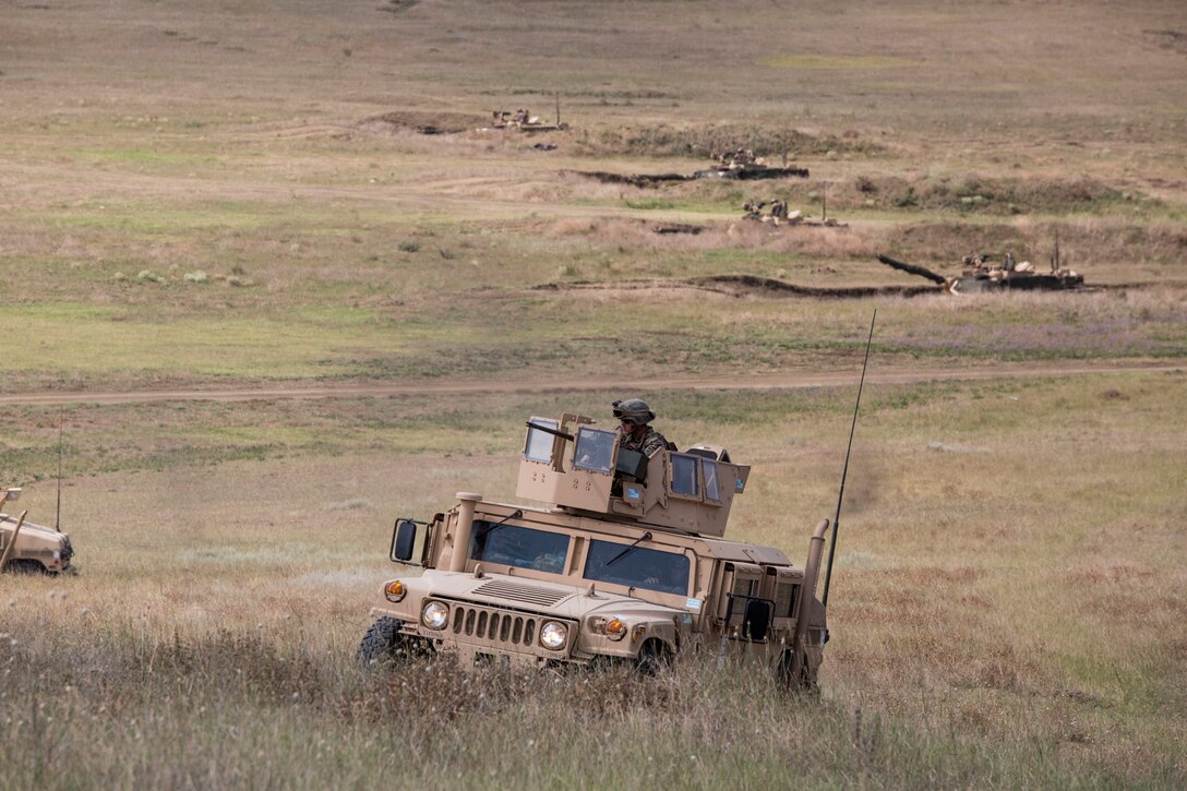 U.S. Marines, with Marine Rotational Force-Europe 19.2, Marine Forces Europe and Africa, begin to conduct a mechanized range during exercise Agile Spirit 2019 in Orpholo, Georgia, August 4, 2019
