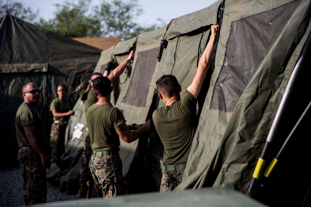 U.S. Marines and Sailors with Special Purpose Marine Air-Ground Task Force-Crisis Response-Africa 19.2, Marine Forces Europe and Africa, establish a forward resuscitative surgical system at a cooperative security location in Dakar, Senegal, July 31, 2019.