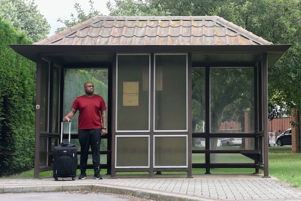 U.S. Air Force Tech. Sgt. Landon Scaife, 100th Air Refueling Wing Equal Opportunity advisor, waits for the bus to take him to the airport at RAF Mildenhall, England, Aug. 6, 2019. Scaife has visited more than 20 countries during his two assignments here. (U.S. Air Force photo by Airman 1st Class Joseph Barron)