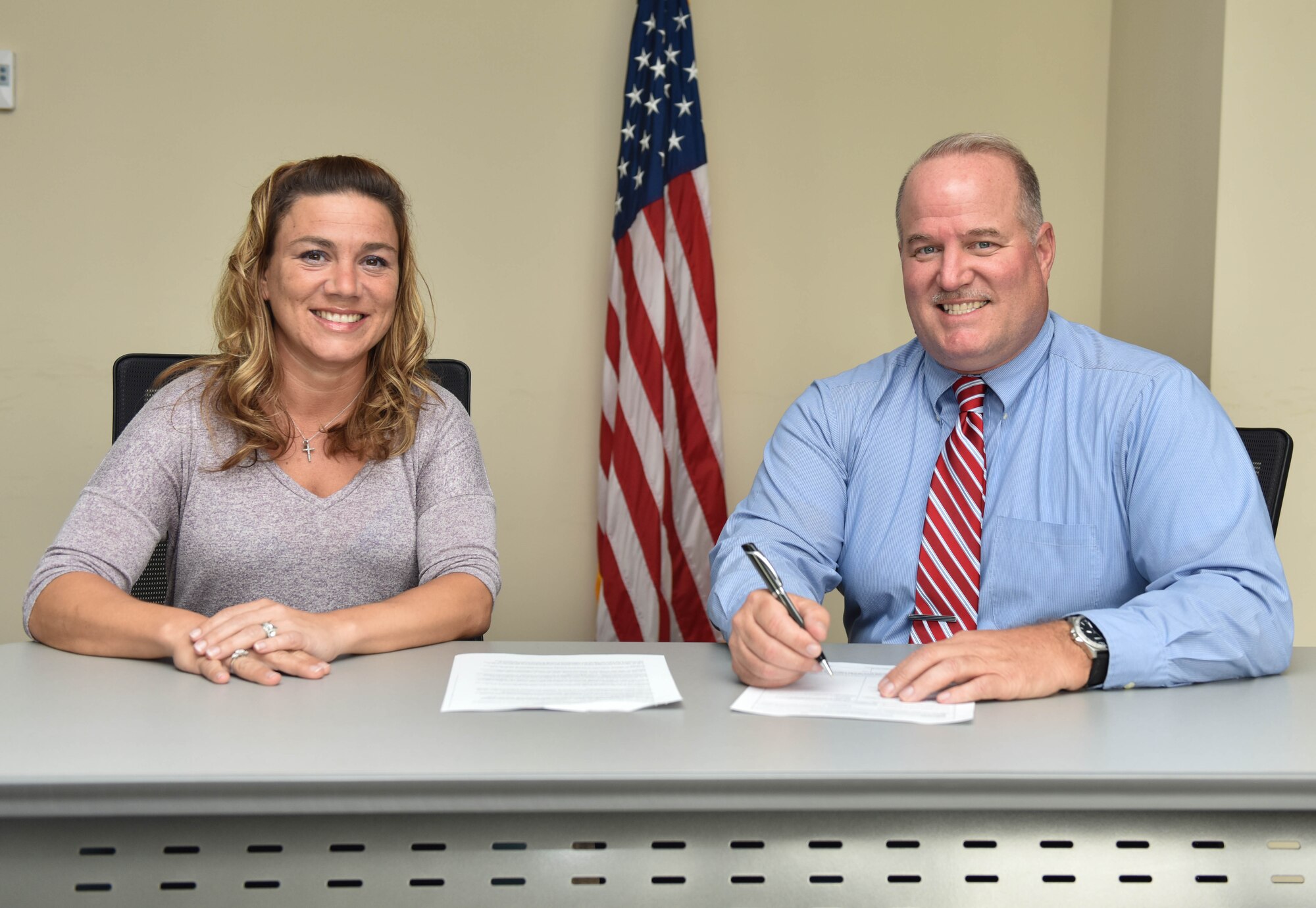 Jim LaBarre, 633rd Air Base Wing Inspector General director and Jennifer Ellis, 633rd ABW IG inspector, pose for a photo at the 633rd ABW IG office at Joint Base Langley-Eustis, VA, Aug. 5, 2019. LaBarre and Ellis talked about the importance of knowing how the IG can help U.S. Army Soldiers and Air Force Airmen. (U.S. Air Force photo by Airman 1st Class Sarah Dowe)
