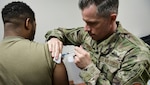 Tech Sgt. Joseph Anthony, medical technician with the 911th Aeromedical Staging Squadron, administers a vaccination to a member of the U.S. Army Reserve’s 336 Engineering Company Command and Control, Chemical Radiological and Nuclear Response Enterprise Team at the Pittsburgh International Airport Air Reserve Station, Pennsylvania, April 11, 2019. Department of Defense-issued vaccinations are used to prevent a variety of diseases that military members may encounter in the course of their duties.