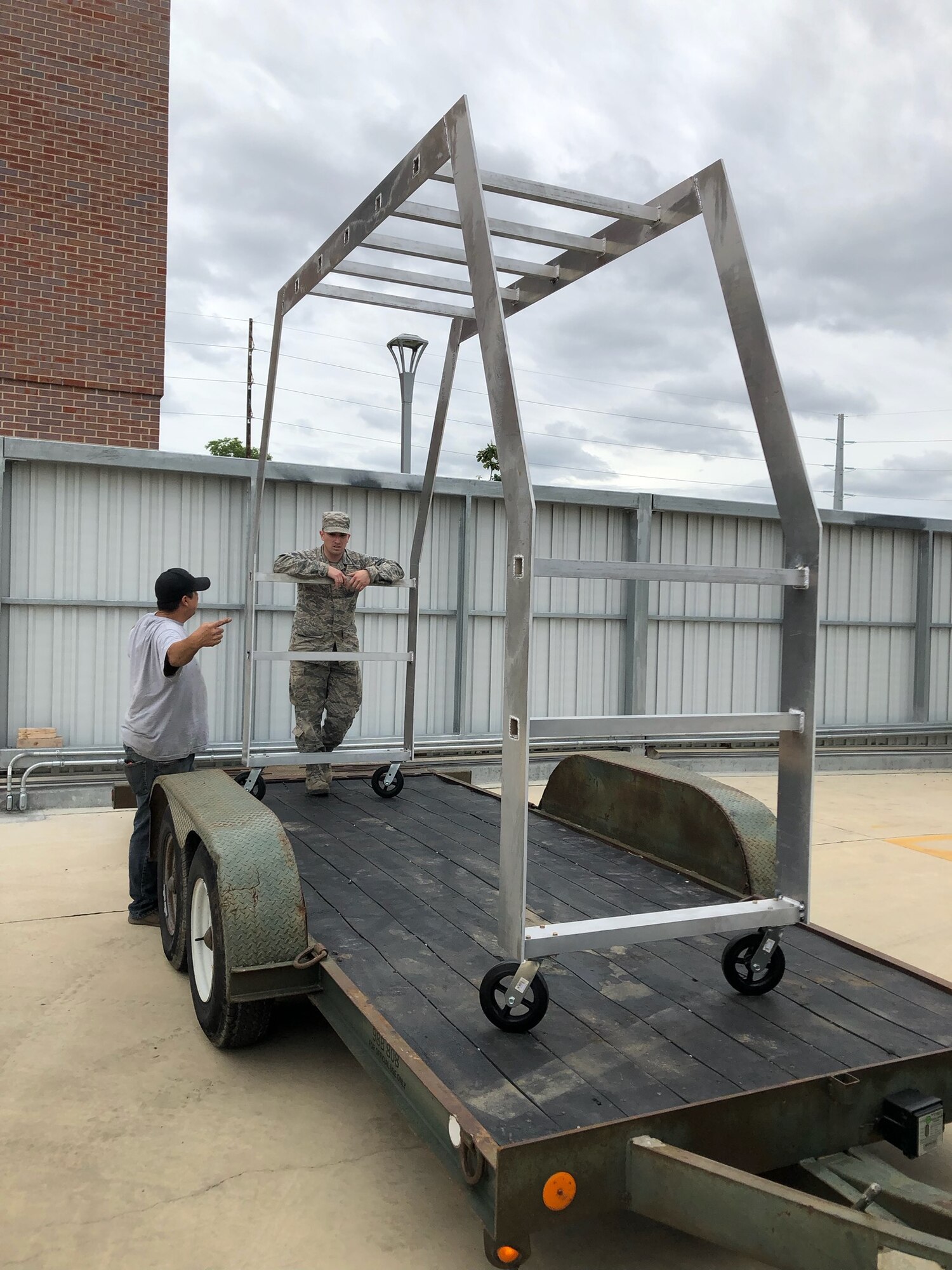 Wichita State University GoCreate Lab members, secure the KC-46A Pegasus Cargo Validation Tool prototype to be moved to McConnell Air Force Base, Kan., May 29, 2019. The validation tool will help aerial porters ensure cargo that is planning to be loaded, will fit inside a KC-46 fuselage without the aircraft present. (Courtesy photo)