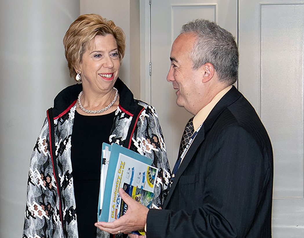 Undersecretary of Defense for Acquisition and Sustainment Ellen Lord (left) talks about the National Defense Strategy with Kim Herrington, acting principal director of defense pricing and contracting, during DLA Industry Day July 31 at the McNamara Headquarters Complex on Fort Belvoir, Virginia.